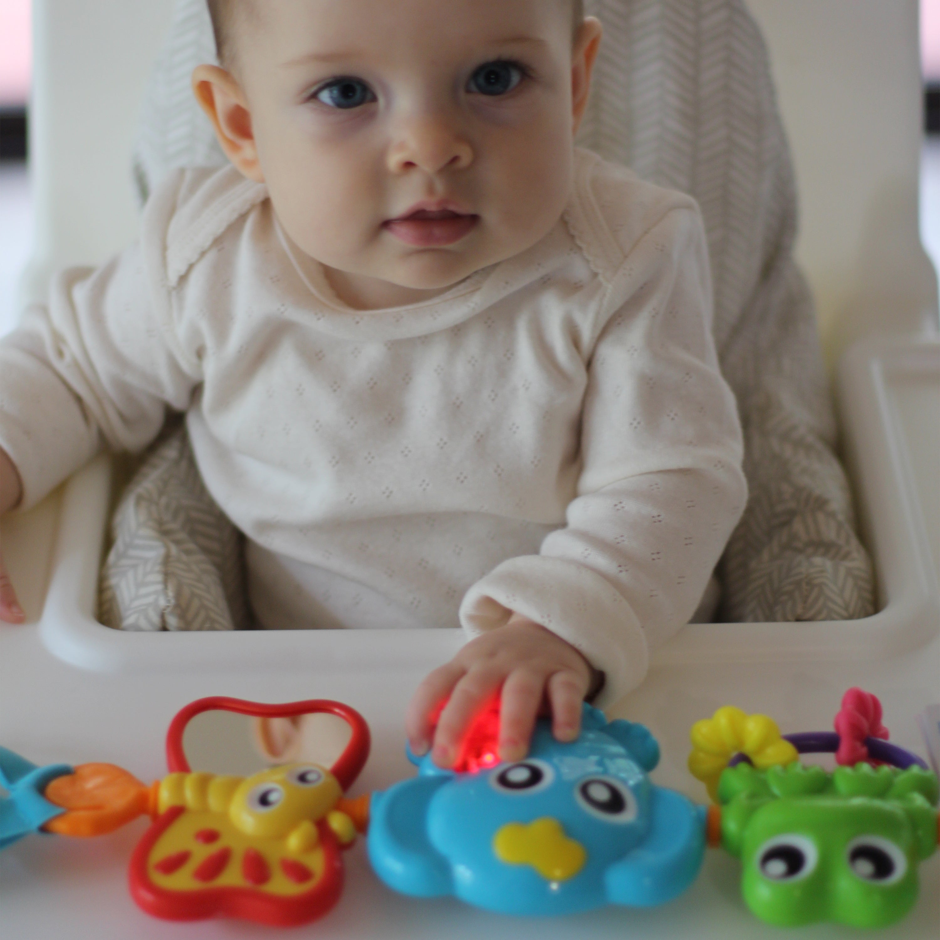 Playgro Travel Trio Musical Pram Tie