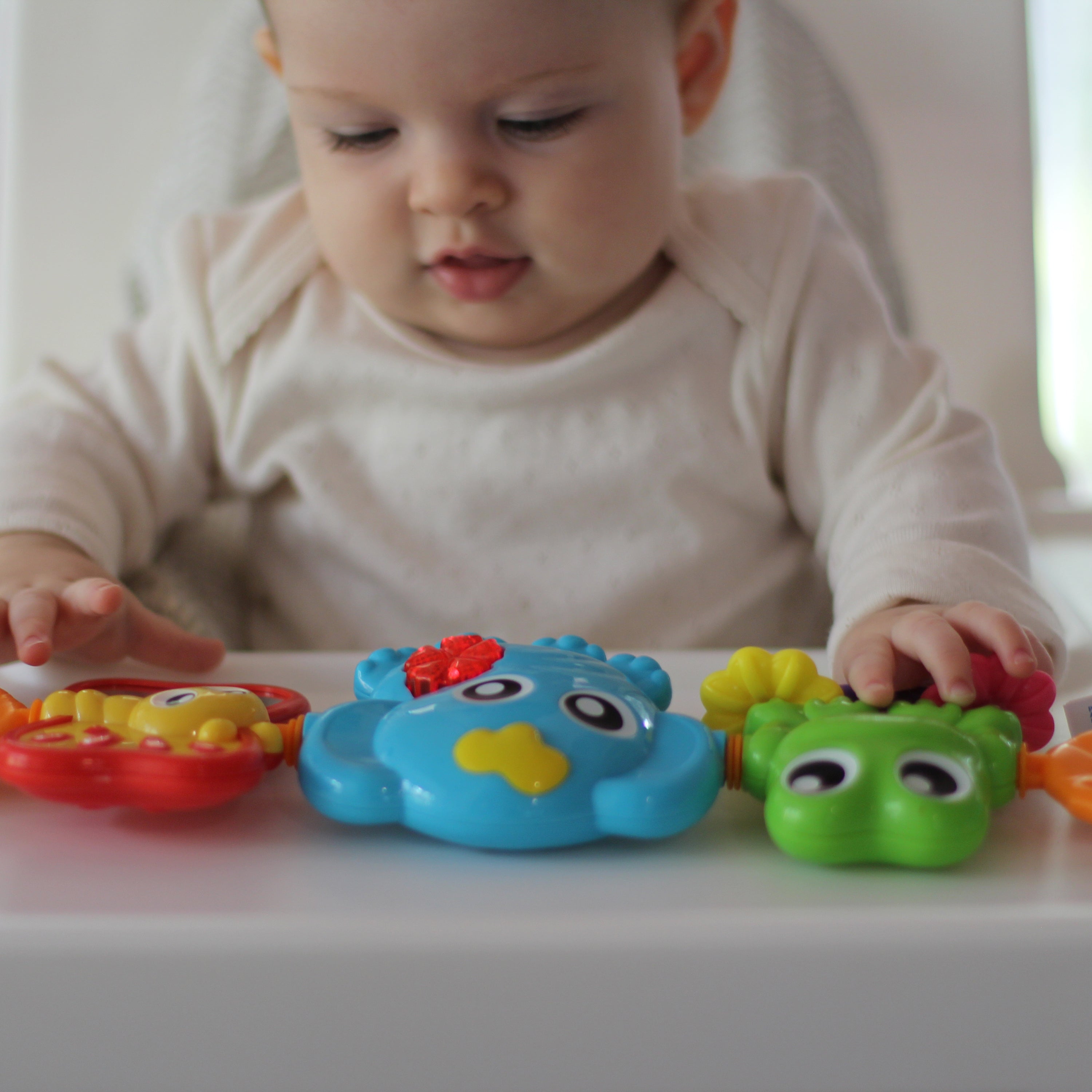 Playgro Travel Trio Musical Pram Tie