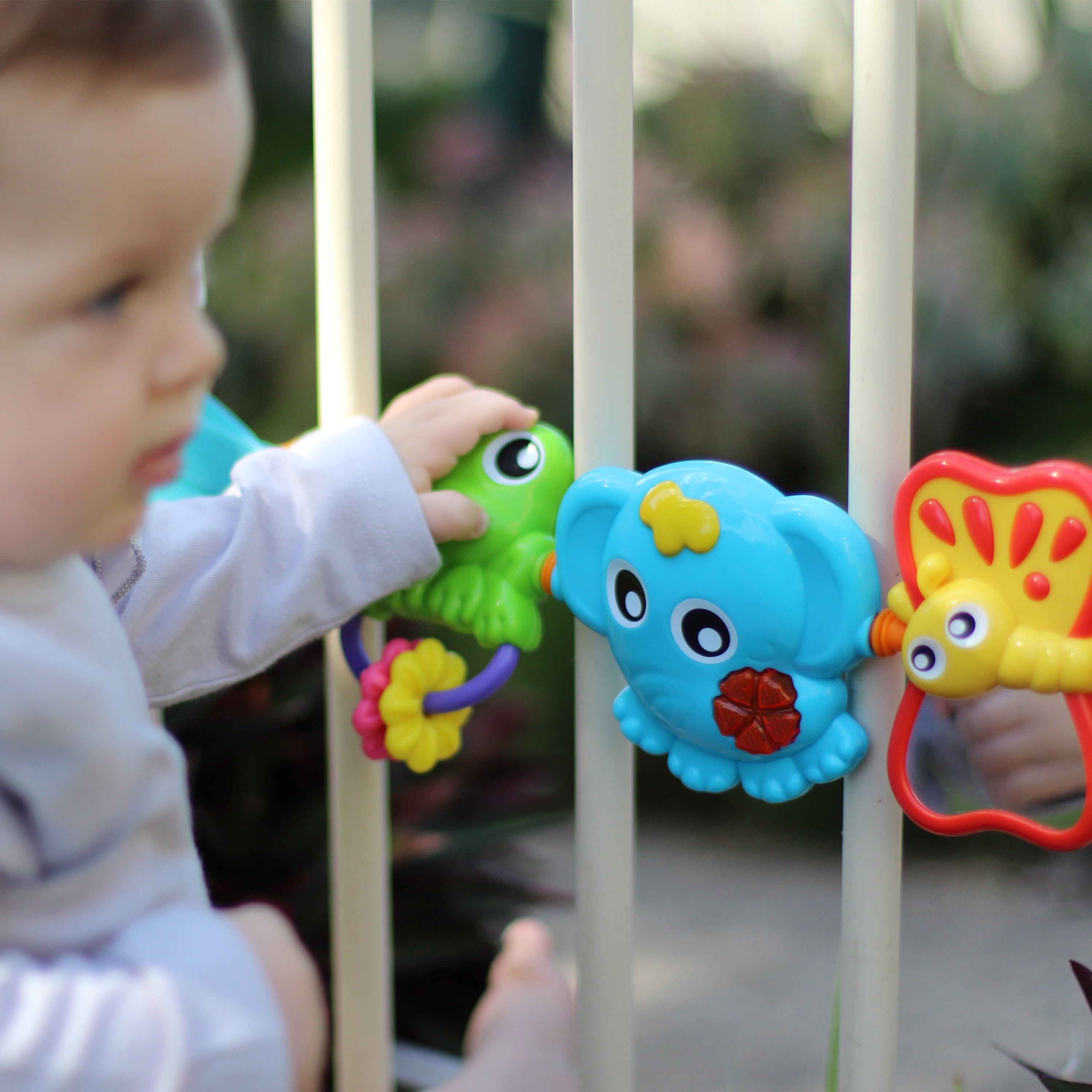 Playgro Travel Trio Musical Pram Tie